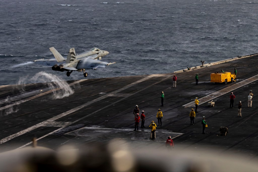 An F/A-18E Super Hornet launches from the flight deck of the Nimitz-class aircraft carrier USS Abraham Lincoln on Friday, July 31, 2026. The launch comes as Washington has targeted Iran's top leadership and economy with sanctions and military strikes since late February.