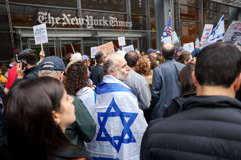 Pro-Israel demonstrators protest outside the New York Times headquarters.