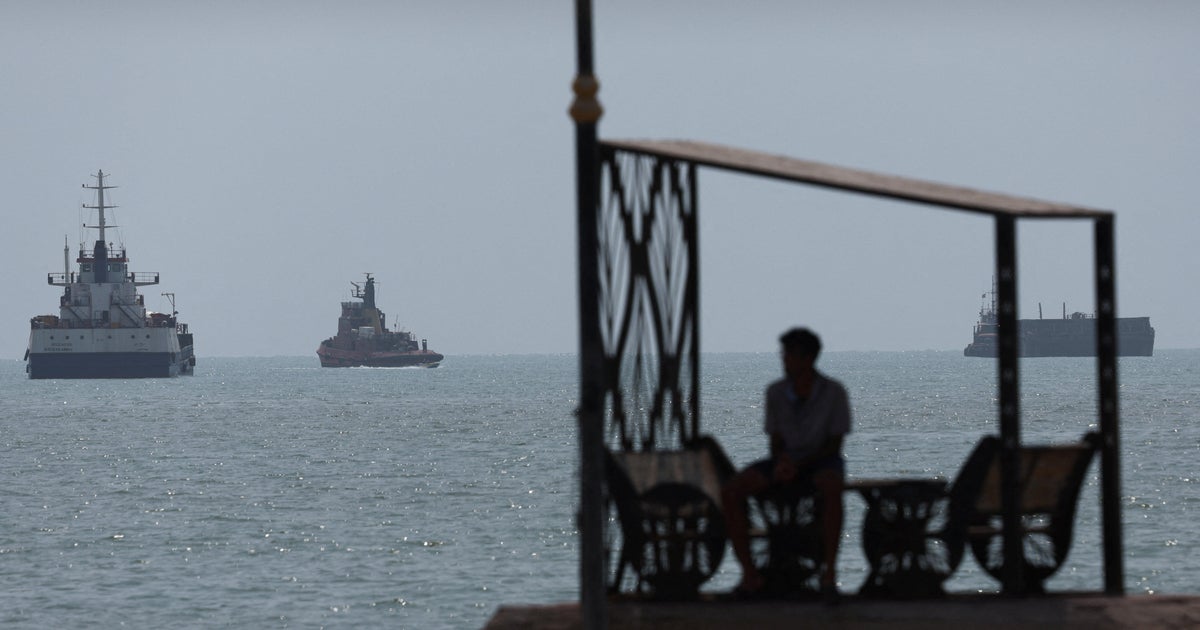 Vessels in the Strait of Hormuz are visible near the beach of Bandar Abbas