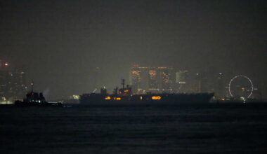 USS Abraham Lincoln sails past Singapore on its way home from Middle East