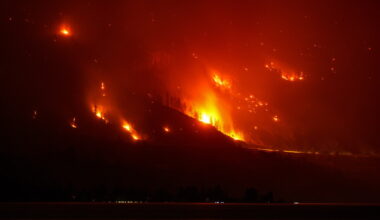 Residents evacuate as wildfires burn in western US and Canada
