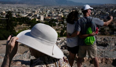 The sunhat is everywhere at tourist sites in Athens as Europe's heat intensifies