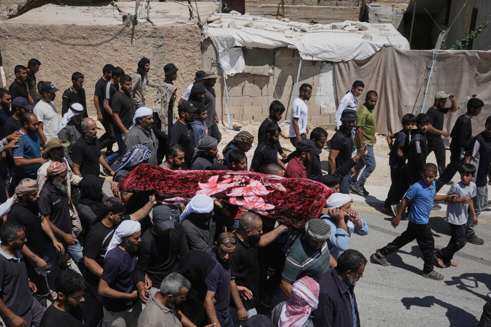 Israel charges a settler in West Bank killing of Palestinian activist