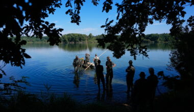 Photos show European fishers on the brink as summer drought parches rivers, lakes and farms