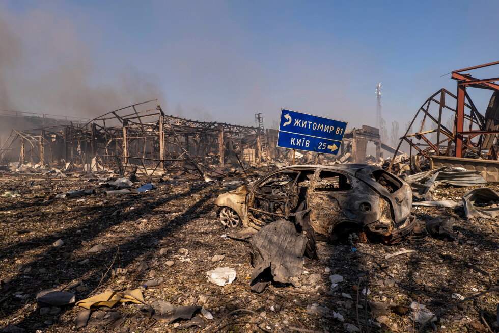 Russian attack hits a warehouse near Kyiv, causing homes to burn and killing at least 37
