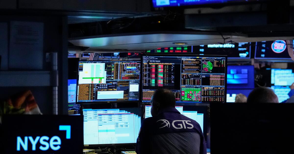 Stocks hold near records on hopes of an agreement with Iran