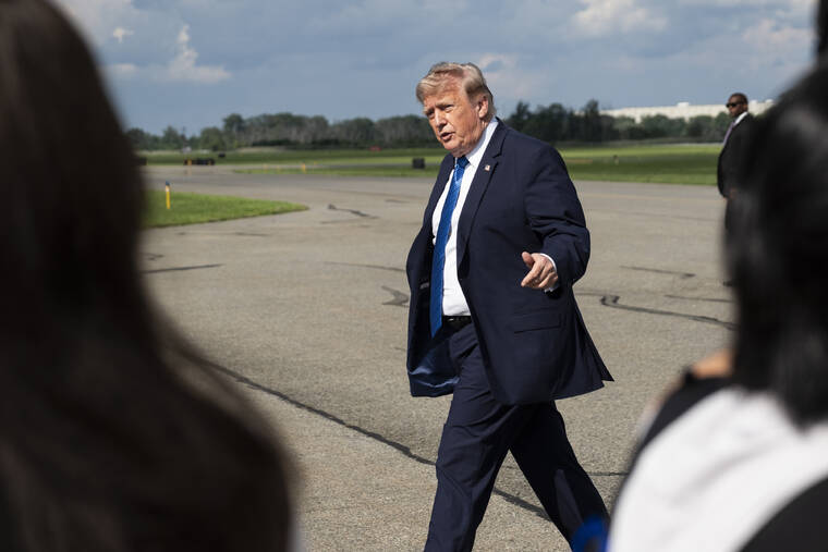 Iran defiant on strait as Trump tells Americans to accept high gas prices