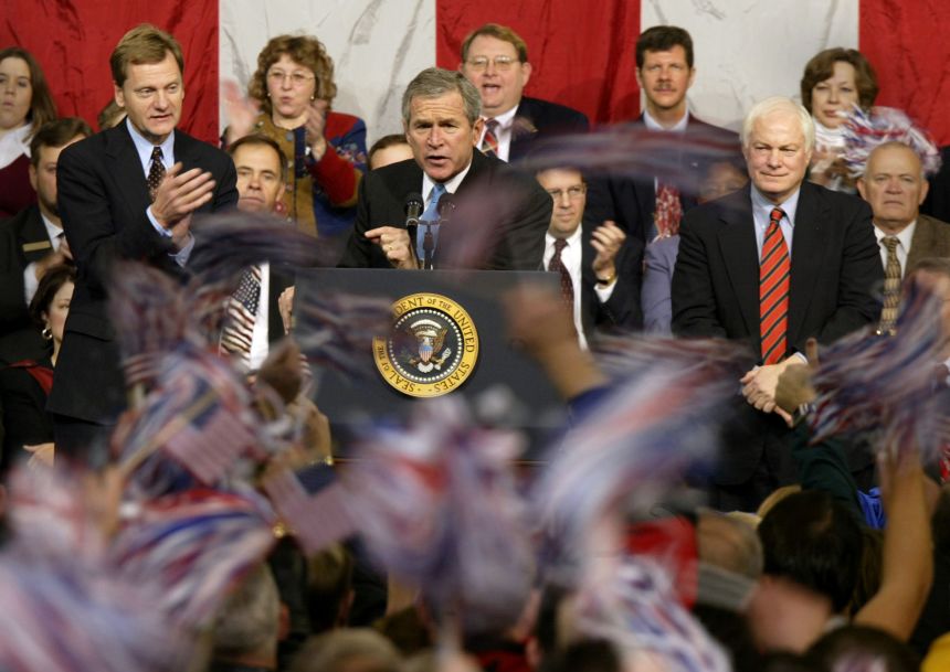 President George W. Bush addresses supporters during a campaign rally in Cedar Rapids, Iowa, on November 4, 2002, ahead of that year's midterm elections.