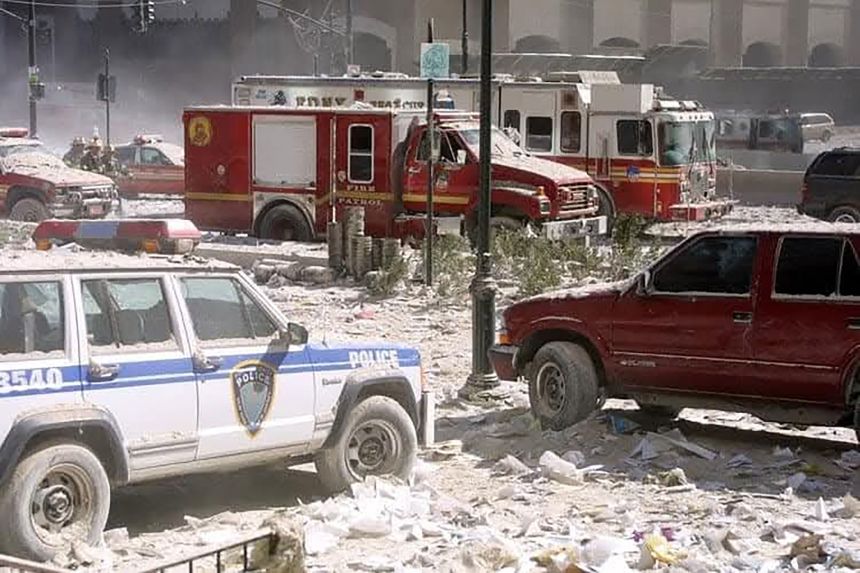 New York Fire Patrol 2 sits parked next to an FDNY rescue unit at Ground Zero.