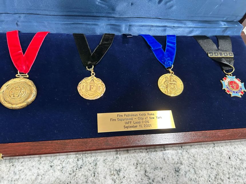 Medals honoring Roma's service.