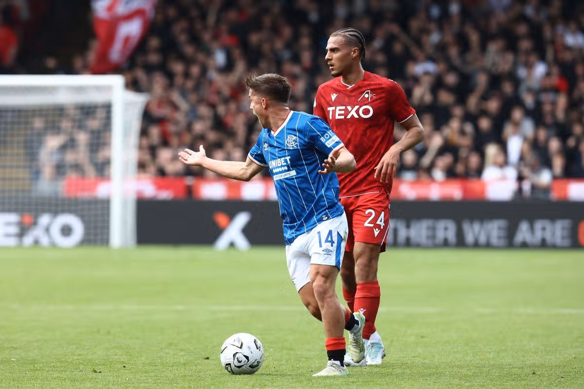 Cammy Devlin on the ball for Rangers