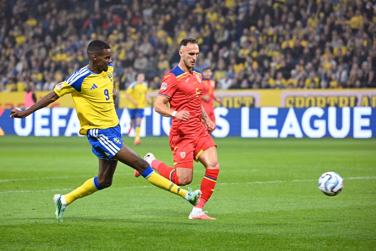 Sweden's forward #09 Alexander Isak (L) shoots and scores his side opening goal during the UEFA Nations League Group B4 football match between Sweden and Romania in Solna, Sweden on September 25, 2026. (Photo by Jonathan Nackstrand / AFP via Getty Images)