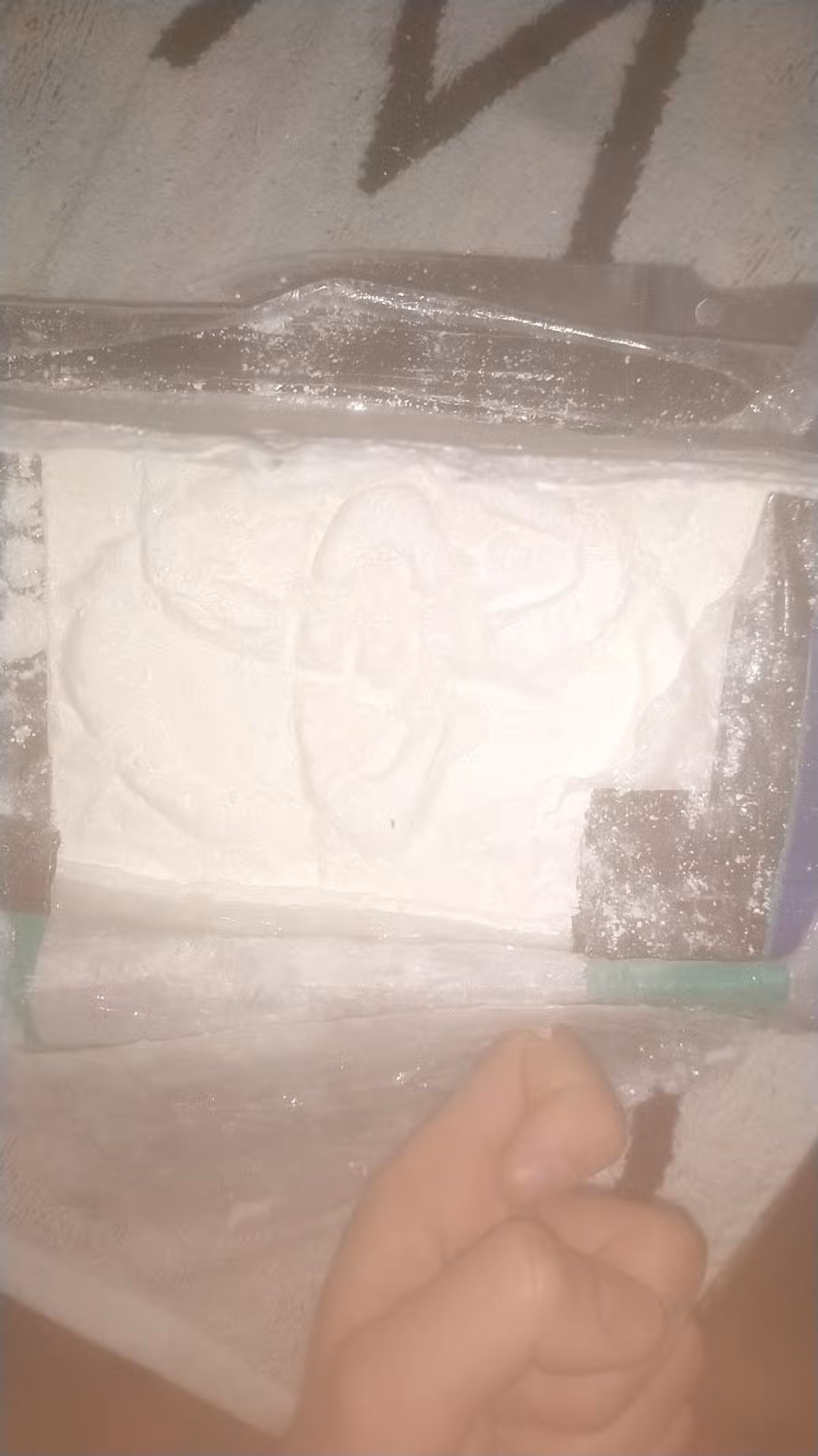 A picture shared by Joshua Smith over EncroChat showing a block of cocaine embossed with a Toyota logo
