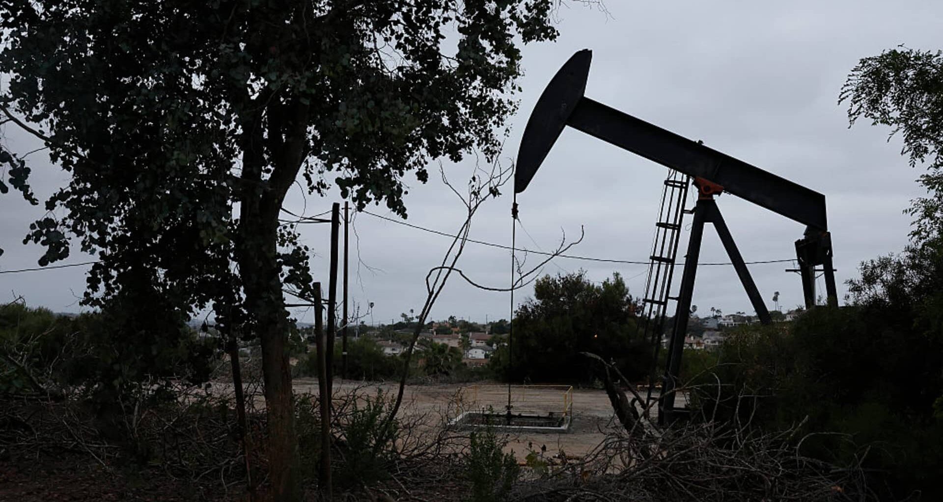 Oil edges down as investors weigh uncertainty over U.S.-Iran strikes