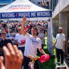 Charlie Kirk throws hats to the crowd after arriving at Utah Valley University.