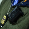 A federal agent wears a body camera as they patrol the halls of immigration court at the Jacob K. Javits Federal Building on March 04, 2026 in New York City.