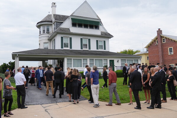 Mourners gather to pay their respects to Glenwood "Bubba" Pysher IV who was killed earlier by police in Pottstown, Pa., Monday, Aug. 31, 2026. (AP Photo/Matt Rourke)