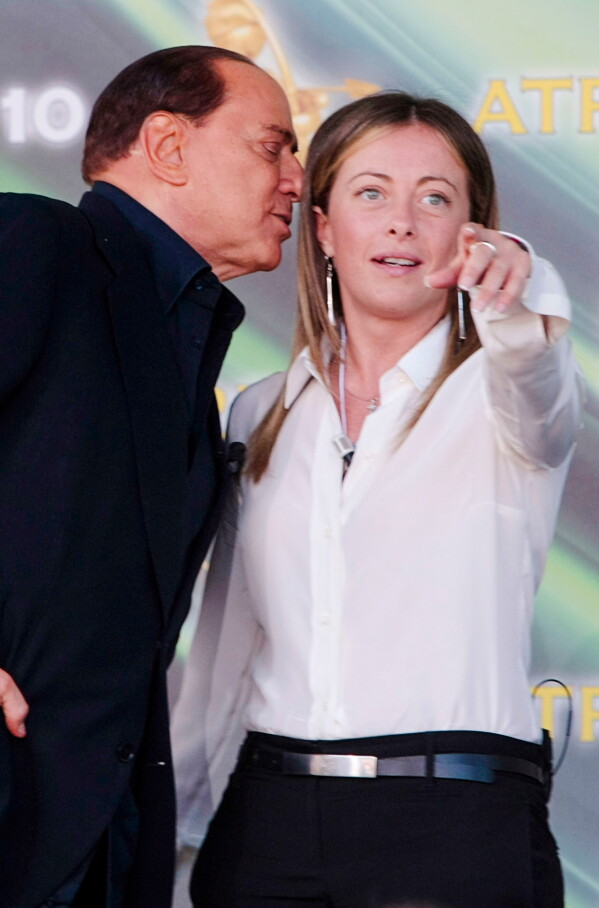 Italian Premier Silvio Berlusconi, left, and Youth Policy Minister Giorgia Meloni meet supporters during a People of Freedom party meeting in Rome, Sunday, Sept. 12, 2010. (AP Photo/Gregorio Borgia, File)
