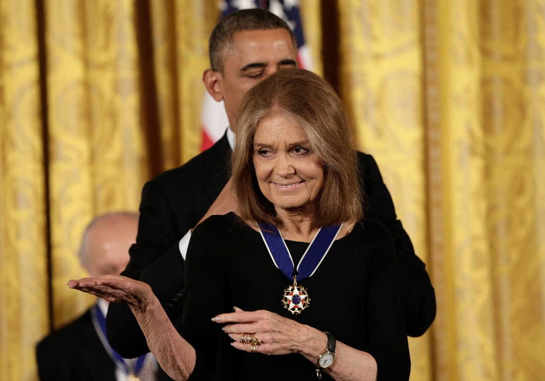 U.S. President Barack Obama awards the Presidential Medal of Freedom to Gloria Steinem in the East Room at the White House on November 20, 2013.