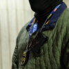 A federal agent's body camera records as they question a woman before she is released as they patrol the halls of immigration court at the Jacob K. Javits Federal Building in March 2026 in New York City.