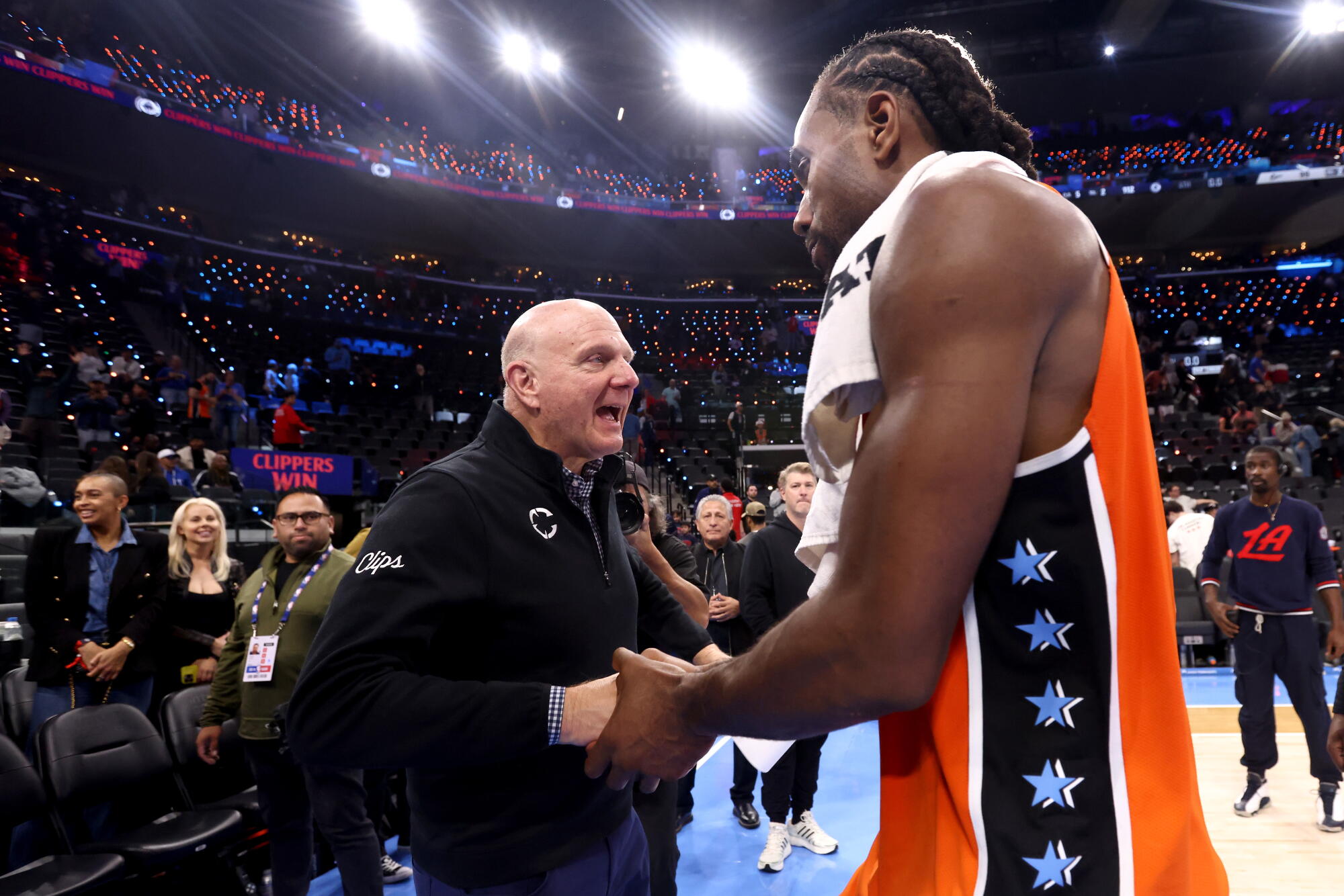 Clippers owner Steve Ballmer congratulates Kawhi Leonard after he scored 55 points in December at Intuit Dome.