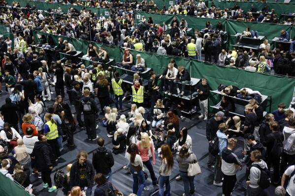 People are attending the civil defense exercise Shelter 2026 in Kuopio, Finland, Wednesday, Sept. 2, 2026. The exercise is testing how a large number of people can be protected in different types of disruption and during emergency conditions. (Matias Honkamaa/Lehtikuva via AP)