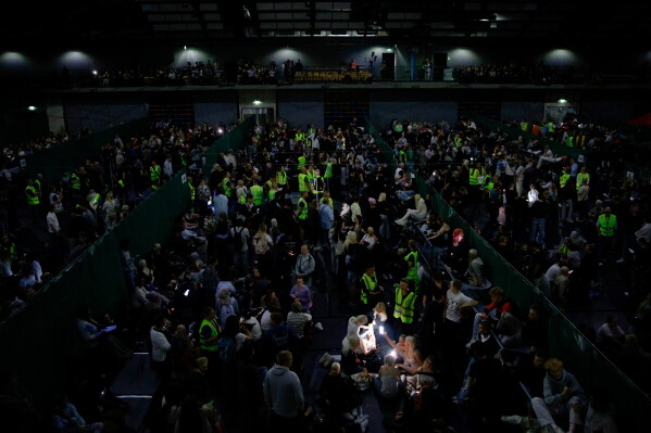 Lights are turned off during the civil defense exercise Shelter 2026 in Kuopio, Finland, Wednesday, Sept. 2, 2026. The exercise is testing how a large number of people can be protected in different types of disruption and during emergency conditions. (Matias Honkamaa/Lehtikuva via AP)