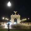 There was no open design competition to select Harrison Design as the architects involved in the 250-foot-tall arch project. Renderings by Harrison Design show the arch at night framing Robert E. Lee's home, Arlington House, behind it.
