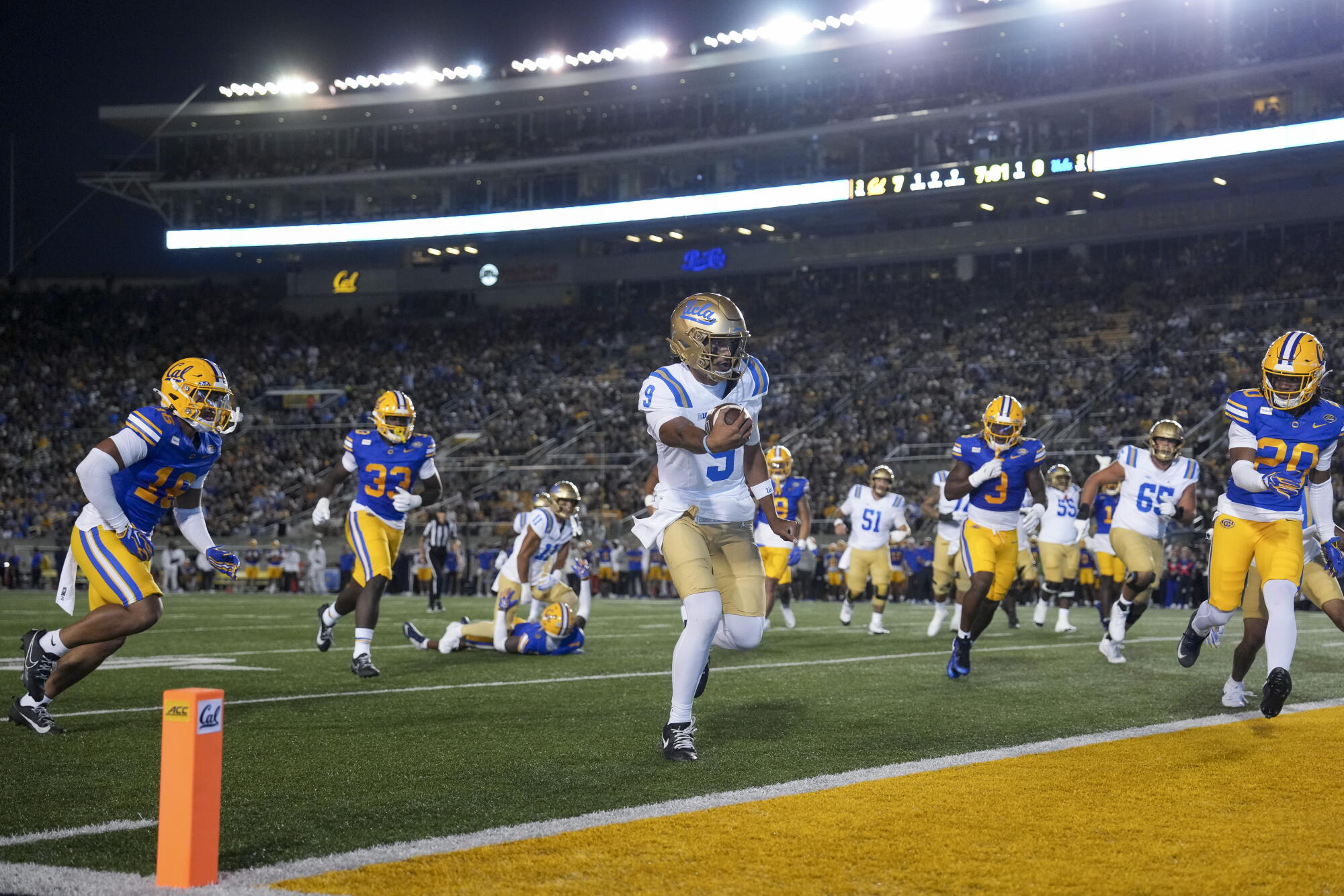 UCLA quarterback Nico Iamaleava scores a rushing touchdown.