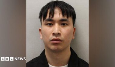 Police custody image of Zhenhao Zou