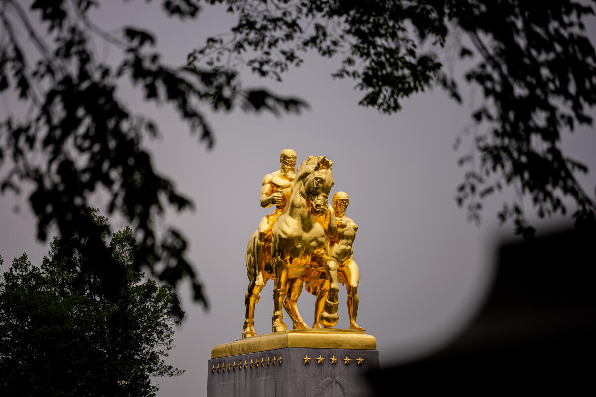 One of the Arts of War statues, newly covered in gold leaf