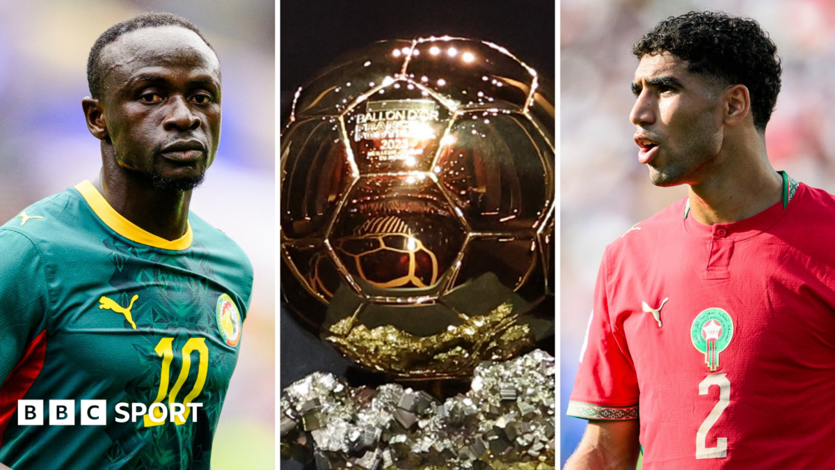 A triptych showing Sadio Mane, the Ballon d'Or trophy and Achraf Hakimi. Mane wears a green Senegal kit with a yellow number 10 on the chest while Hakimi wears a red Morocco shirt with a gold number two on the chest. The golden Ballon d'Or trophy which sits between them is a football divided into hexagonal patches sitting atop a glittering chunk of mineral ore