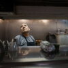Miguel Hernandez reads an order slip while standing in a restaurant kitchen.