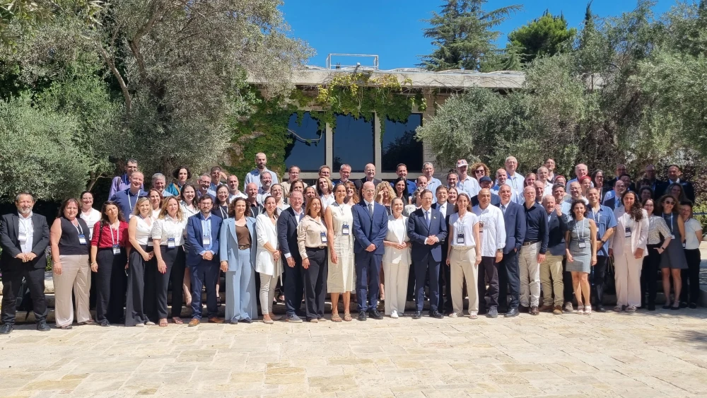 Israeli President Isaac Herzog, center, with researchers, innovators and officials attending the Horizon Europe Award Ceremony at the President’s Residence in Jerusalem on Sept. 8, 2026. Photo by Sharon Altshul.