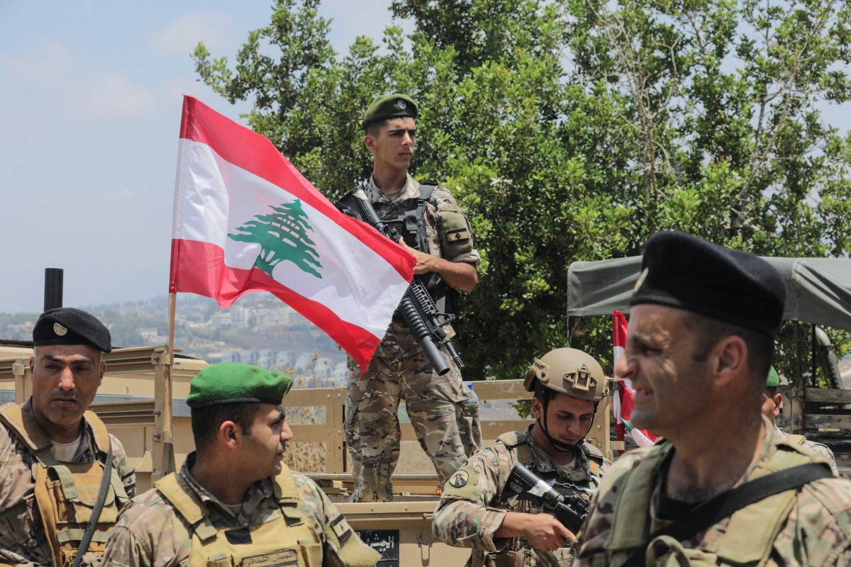 Lebanese soldiers patrol at the entrance to Zawtar al-Gharbiya on July 22, 2026, after the army deployed to the southern village. (AFP)