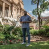 Paleontologist Lazarus Kgasi in front of the Ditsong National Museum of Natural History in Pretoria, South Africa, where he works as a laboratory manager and junior curator. Kgasi, who began working on fossil sites as a hired labourer with no knowledge at all of fossils, has over time emerged as a prominent figure in South African paleontology, and one of only a handful of Black South Africans in what remains an overwhelmingly White-dominated field.
