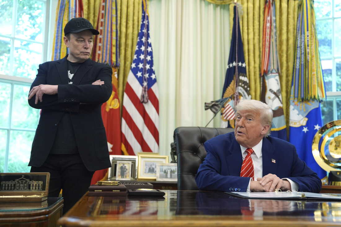 President Donald Trump, right, speaks during a news conference with Elon Musk in the Oval Office of the White House, Friday, May 30, 2025, in Washington.