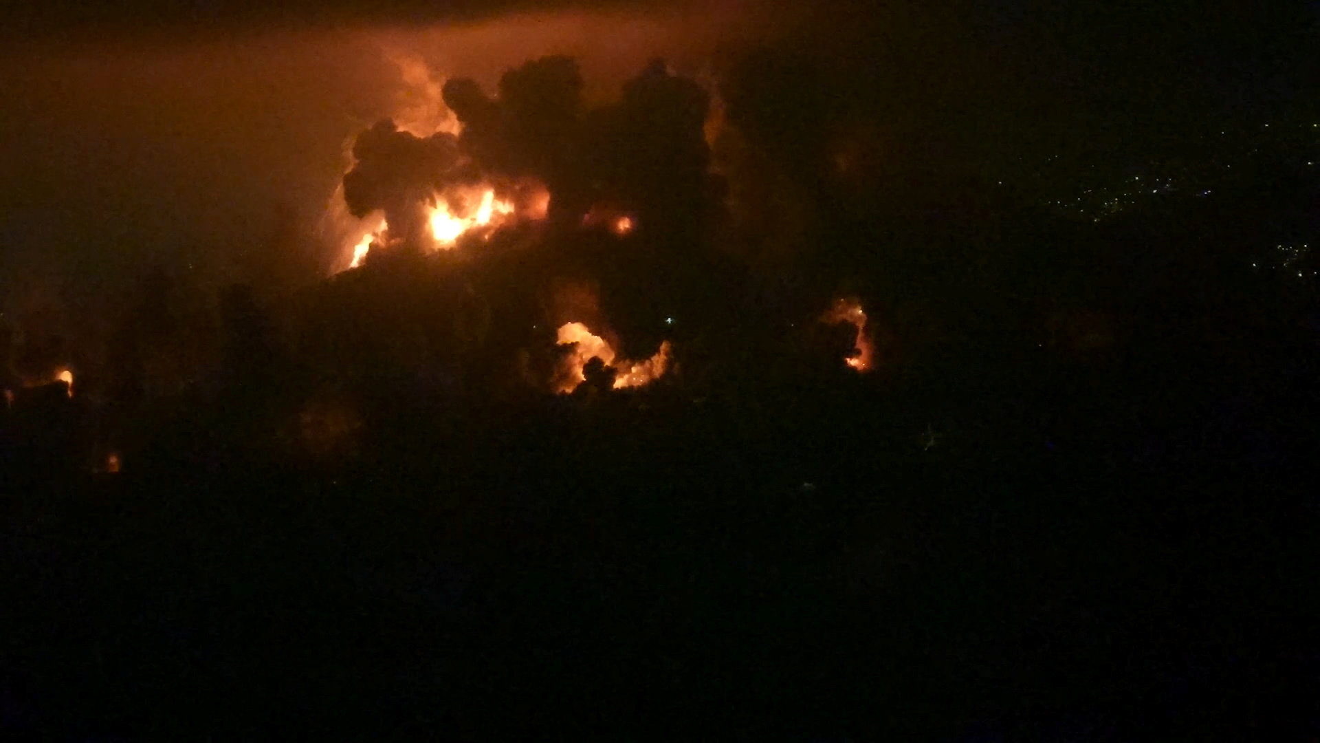Screen grab showing explosions that Israel says destroyed key underground infrastructure built by the Iran-backed Hezbollah group on the strategic Ali Al-Taher ridge in southern Lebanon. AFP/File