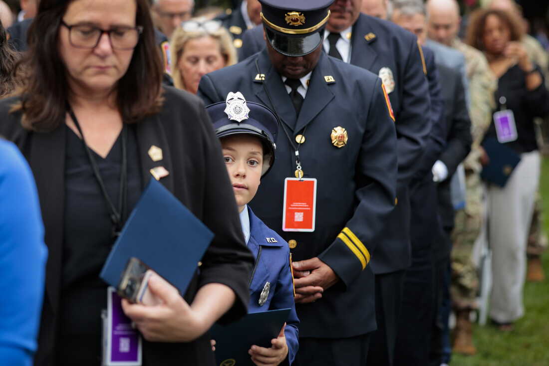 Hillel Schultz, 8, looks on during a ceremony commemorating the 25th anniversary of the September 11th terrorist attacks in the courtyard of the Pentagon on Friday in Arlington, Va.