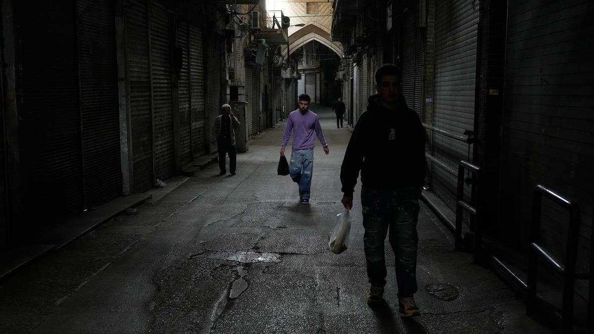 Amid war and sanctions, many Iranians are losing their jobs and struggling to get by