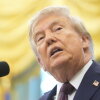President Donald Trump speaks during an event in the Oval Office of the White House on Tuesday.
