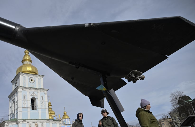 People look at an Iranian-designed HESA Shahed 136 (Geran-2) drone at an open-air exhibition of destroyed Russian military equipment on Mykhailivska Square in front of Saint Michael's Golden-Domed Cathedral, in Kyiv, on April 7, 2026.