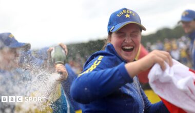 Lottie Woad is doused in champagne as she celebrates Europe's Solheim Cup victory