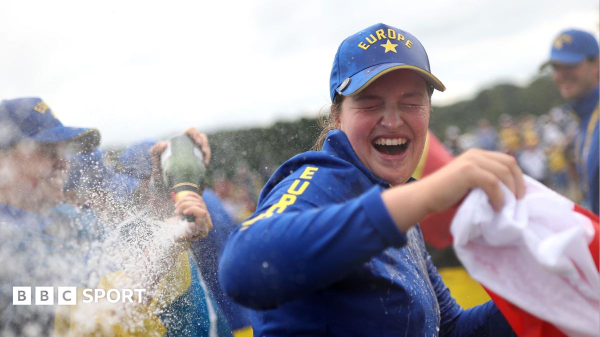 Lottie Woad is doused in champagne as she celebrates Europe's Solheim Cup victory