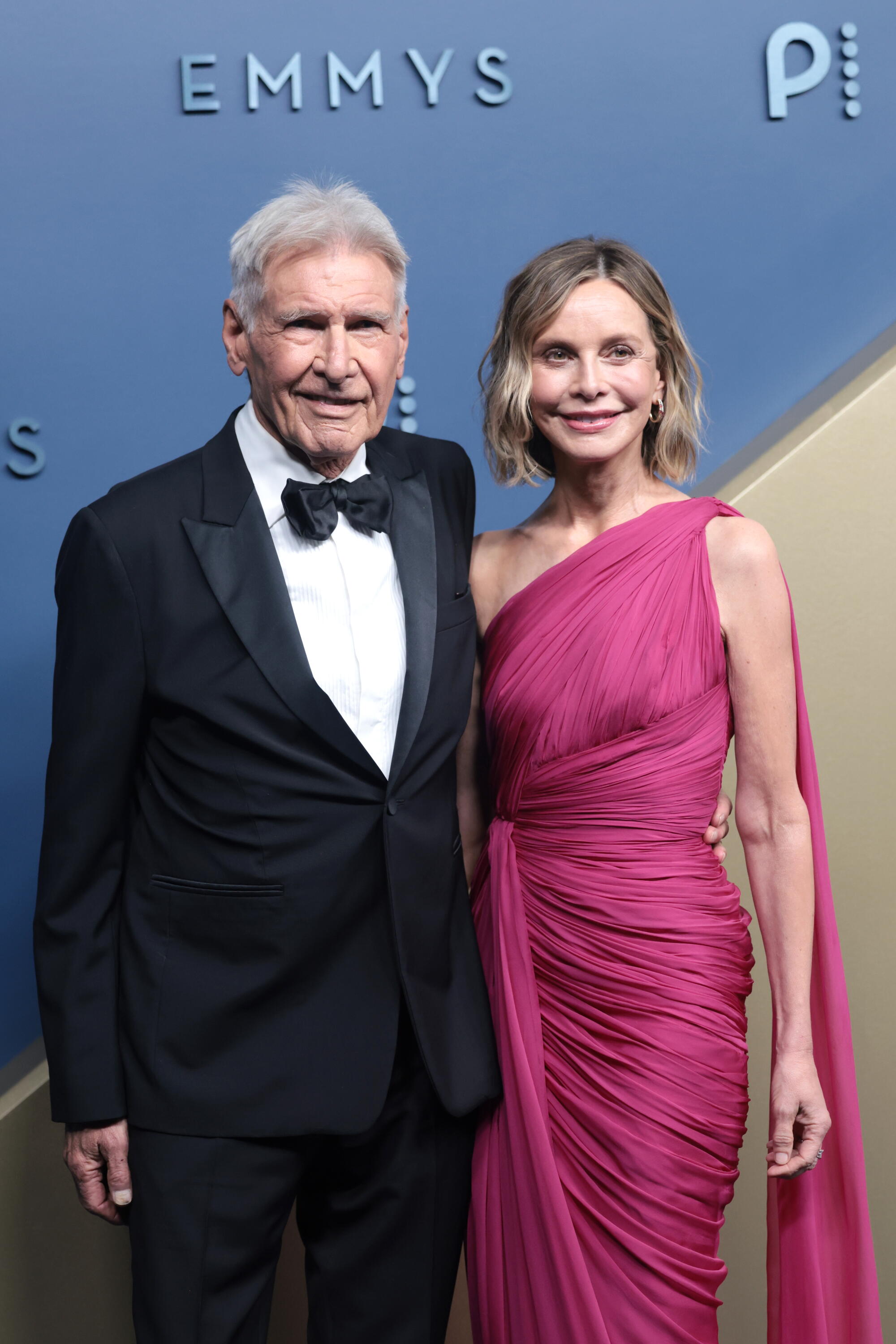 Harrison Ford and Calista Flockhart pose on the Emmys red carpet. 