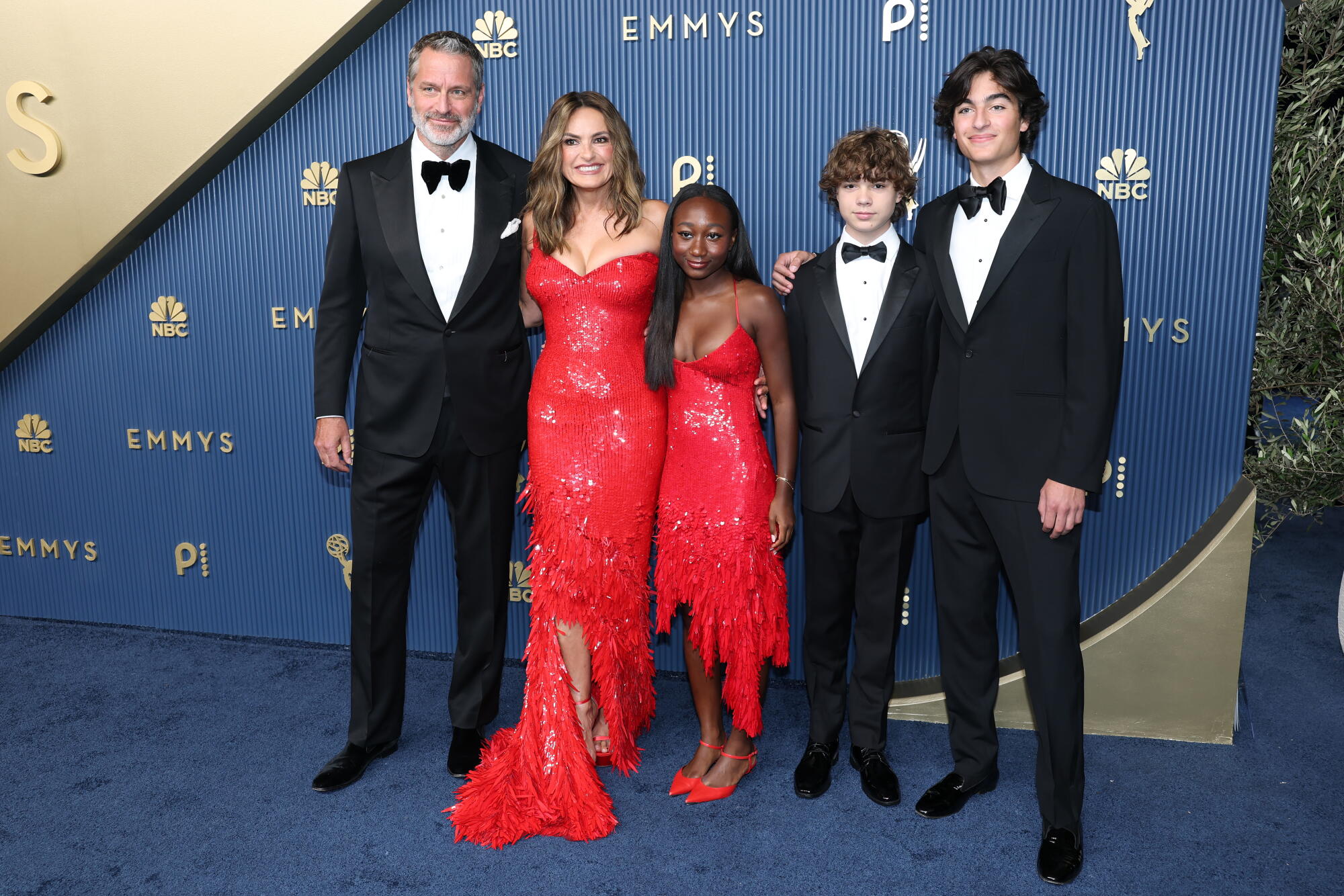 Peter Hermann, Mariska Hargitay, Amaya Hermann, Andrew Hermann and August Hermann walk the Emmys blue carpet.
