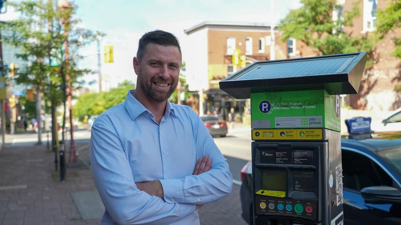 A man and a parking machine