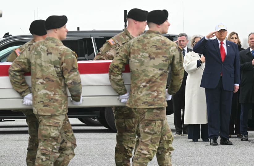 Members of a US Army team carry a flagged-drapped transfer case containing the remains of US soldier Capt. Cody A. Khork during a dignified transfer solemn event at Dover Air Force Base, in Dover, Delaware, on March 7, 2026.