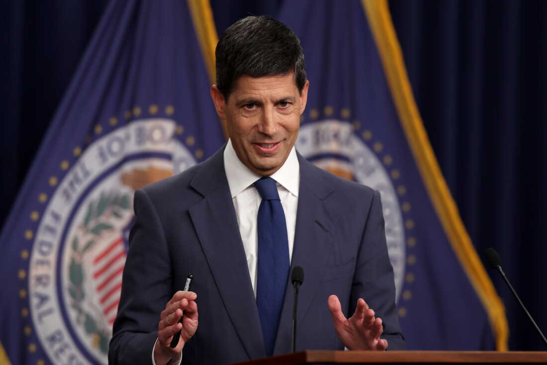 In a news conference after the Fed raised rates, Kevin Warsh called inflation "too high."
