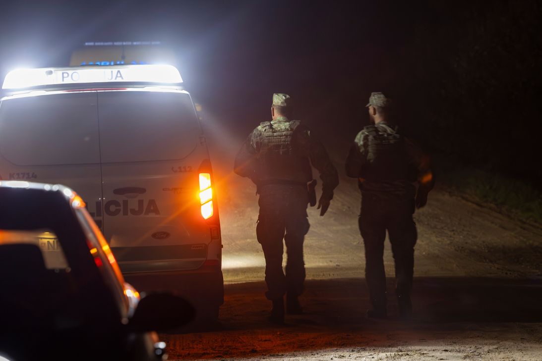 Lithuanian soldiers secure the area where Italian fighter jets shot down a drone during NATO's Baltic Air Policing Mission near Pratkunai village, located north of the capital Vilnius, Lithuania, on September 15.